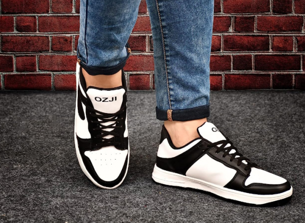 Sepatu sneakers dengan detail aksen berwarna kontras